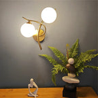 Luminaire "Orbite" – Applique Murale aux Lignes Courbes et Globes Opalins Mes Luminaires