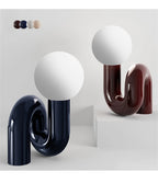 Luminaire "Sinuous" – Lampe Globe avec Pied en Forme de Serpent Mes Luminaires