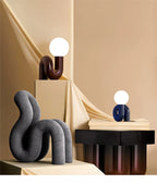 Luminaire "Sinuous" – Lampe Globe avec Pied en Forme de Serpent Mes Luminaires